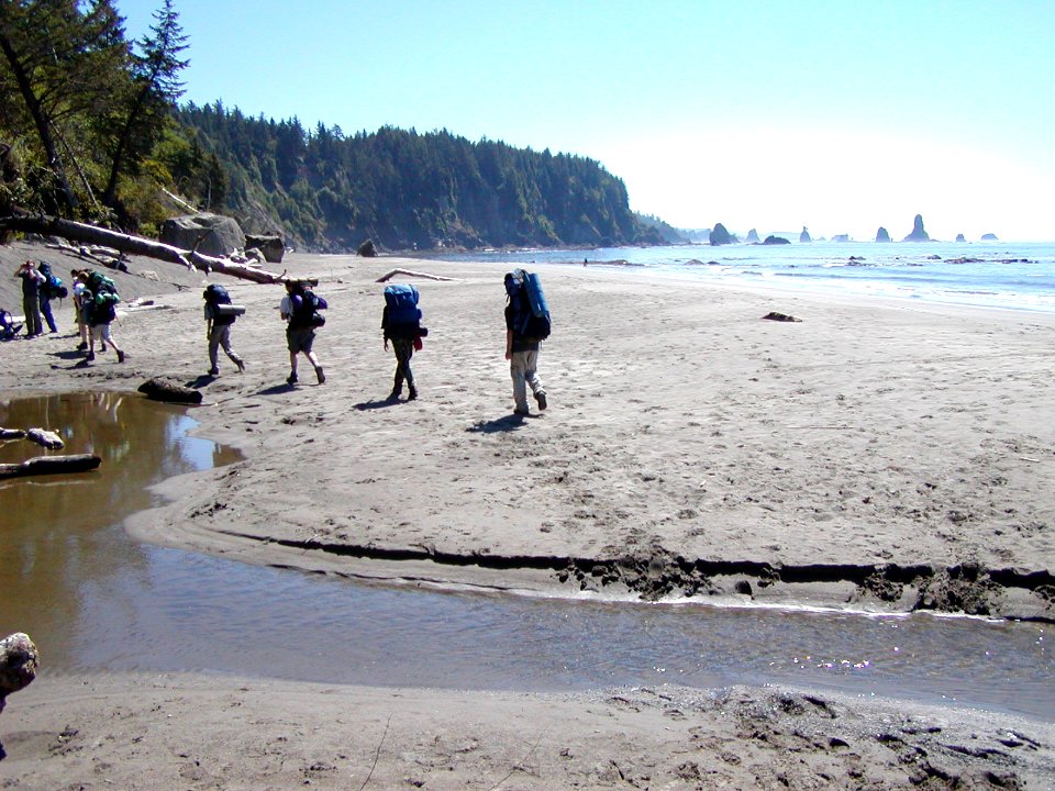 backpackers beach hike group nps photo