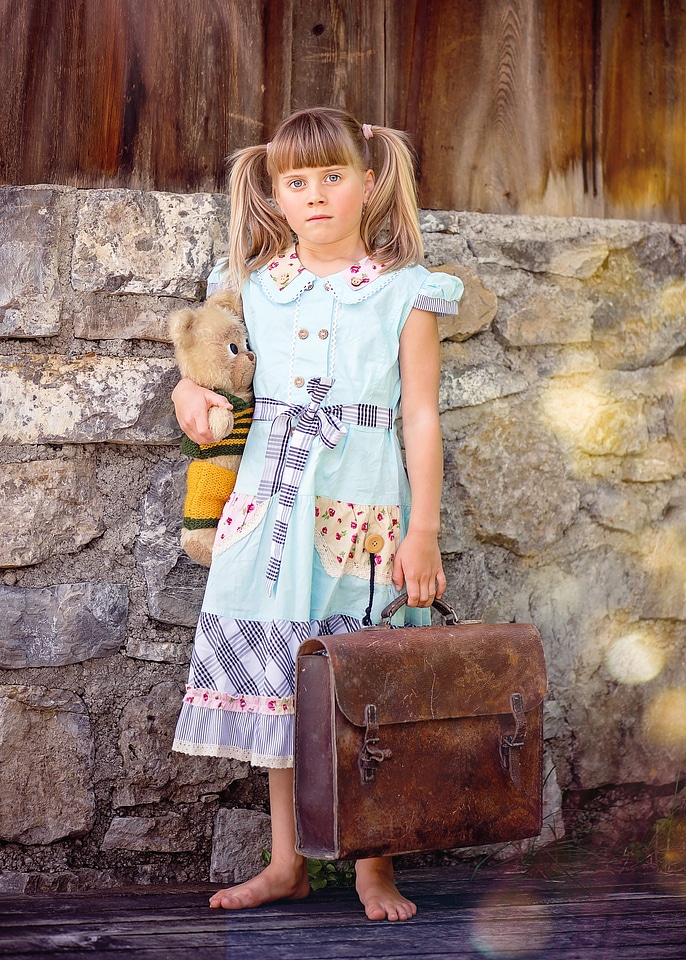 Girl blond teddy bear