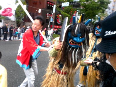 Dontaku parade: Seriously, you shouldn't casually tap the shoulder of the guy with the big knife...