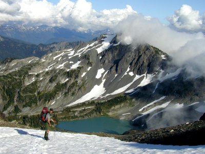 Stephen Basin Lake alpine hiker nps worker photo