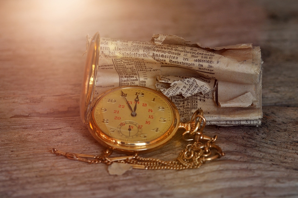 Gold clock face wooden table