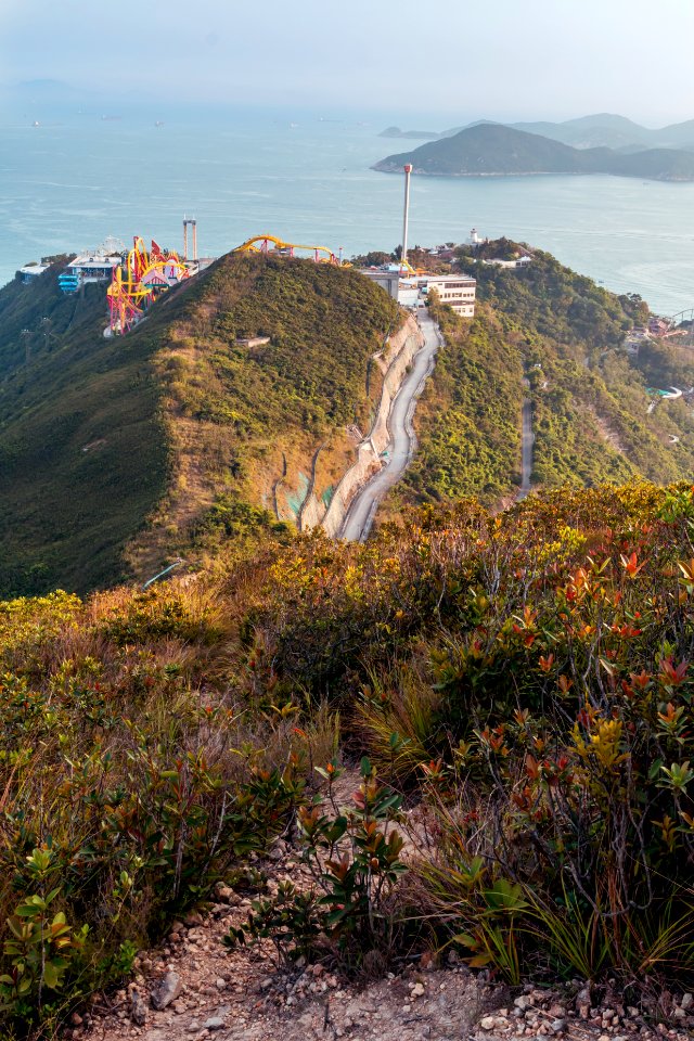 View of clouds, boats, Middle islands, buildings in seaside in Deep Water Bay, Hong Kong seen form brick hill (nam long shan)