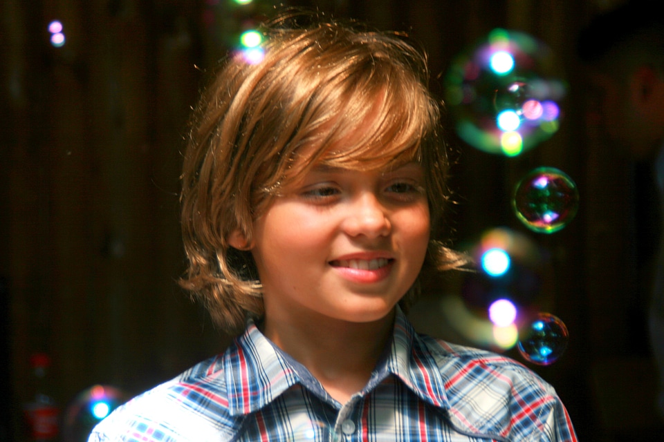 Boy bubbles play