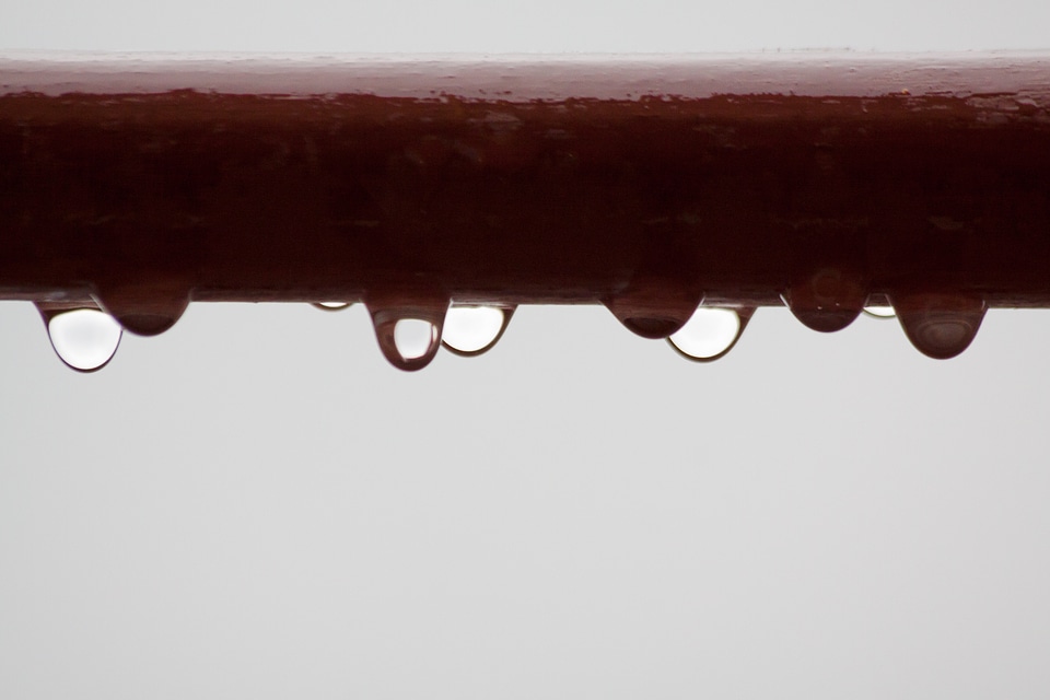 Grey wet drop of water