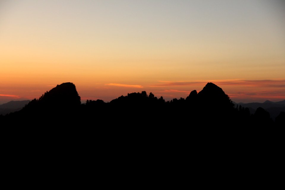 ridgeline sunset orange black mountains pzaidel credit required