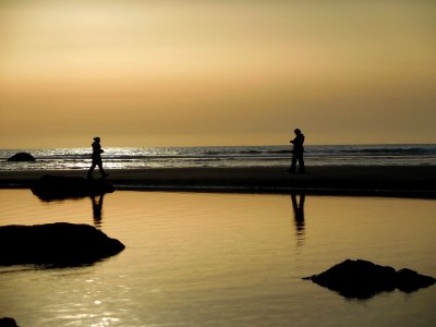 vistors silhouette sunset ruby beach coast c bubar march 04-2015 photo