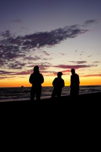 three silhouettes visitors sunset rialto beach d archuleta 2015