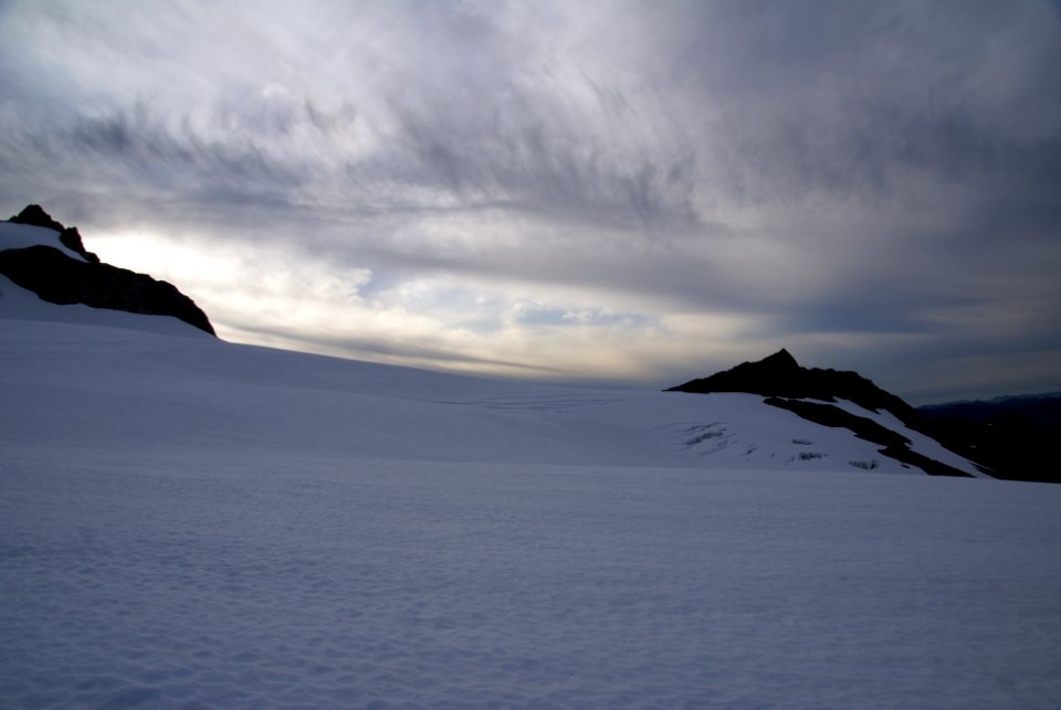 clouds glacier close mountains sunrise NPS photo 2011