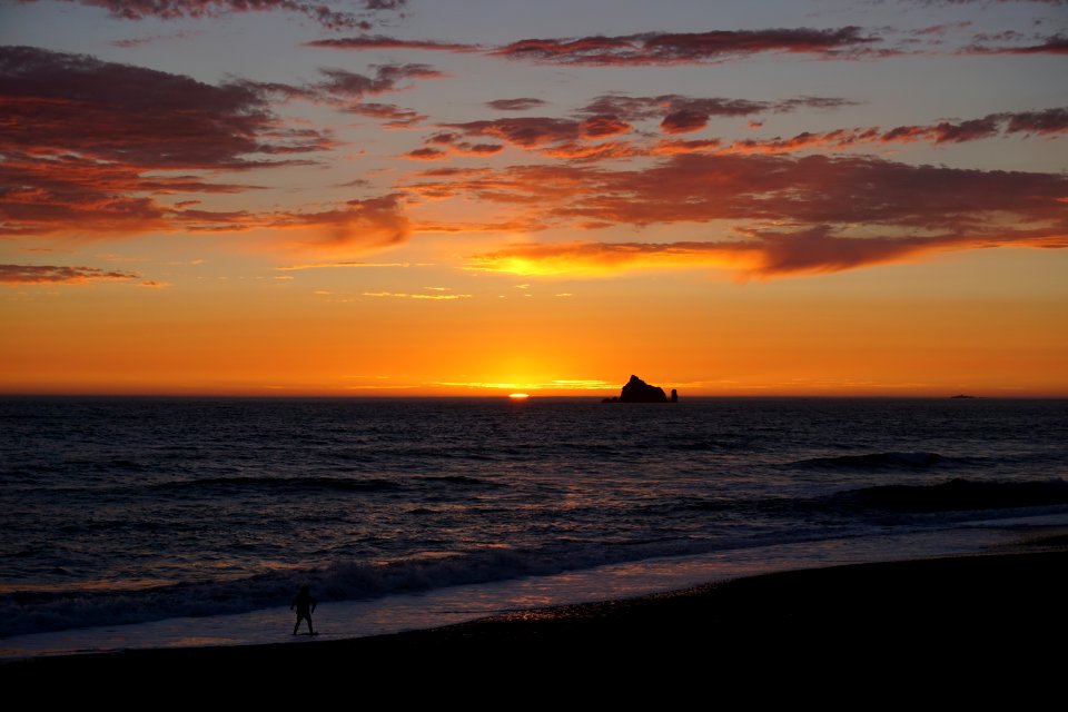 rialto beach sunset kid silhouette playing surf d archuleta 2015