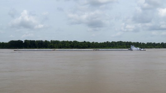Tugboat pushing a barge on the Mississippi