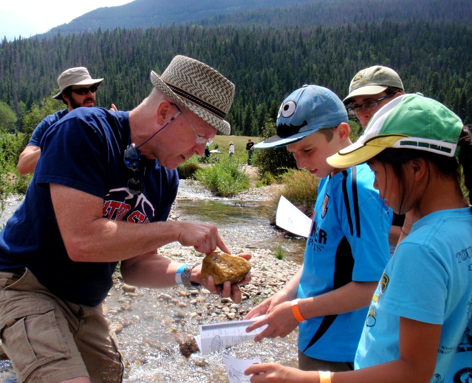 Dr. Hancock pointing to black fly larvae. Photo by NPS/Brittni Medina.(2)
