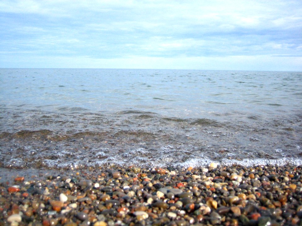 Pebbles, Sun, Water, Sky