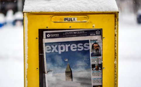 Snow-Covered Newsstand in Washington, DC