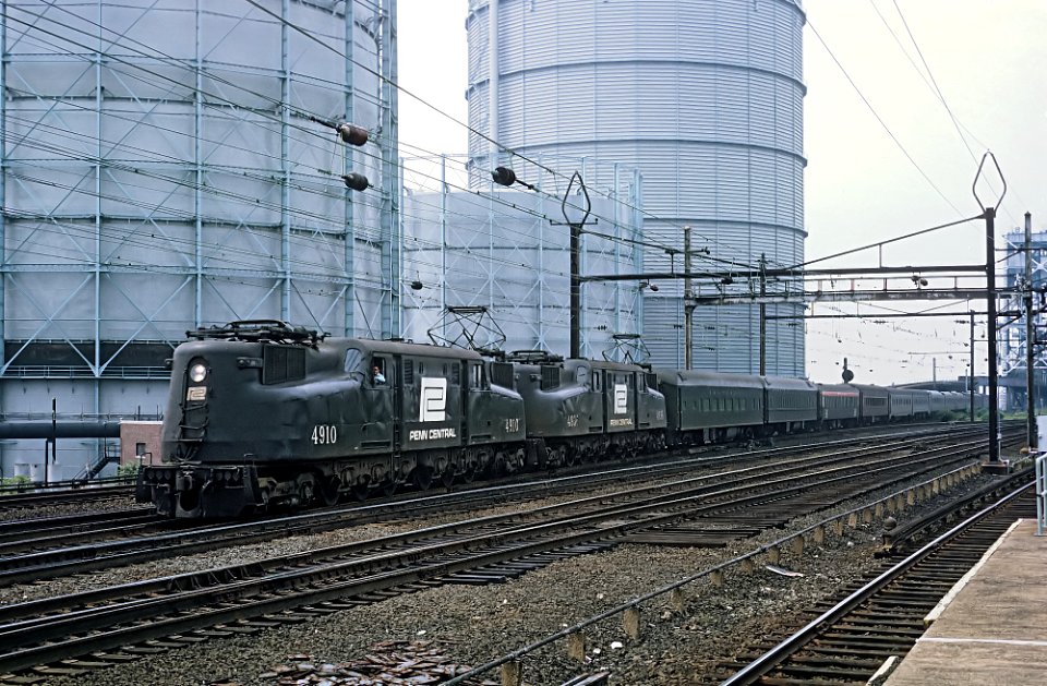 PC GG1s 4910 and 4916 at Harrison, NJ July 4, 1969