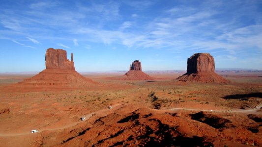 Arizona/Utah - Oljato-Monument Valley: the imposing red rock towers "West Mitten Butte", "East Mitten Butte" and "Merrick Butte" (from left to right) - from the most famous view point photo