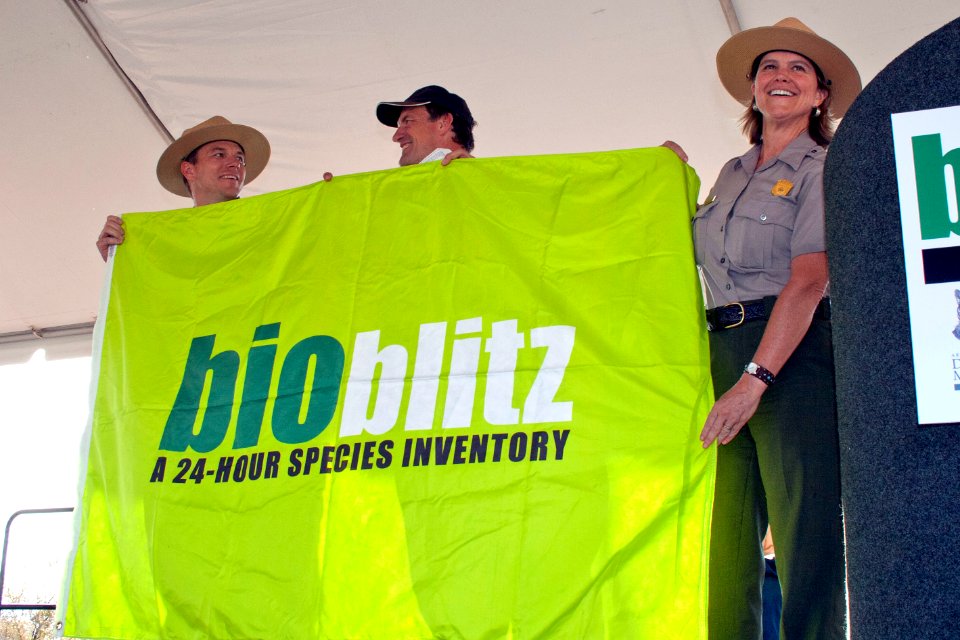 Passing the official flag to Rocky Mountain National Park for the 2012 BioBlitz. Photo by NPS/Todd M. Edgar.