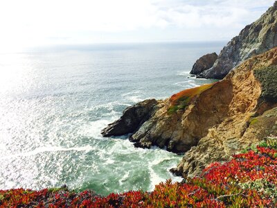 Rocky cliff ocean photo