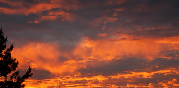 Blazing sky clouds red orange sky photo