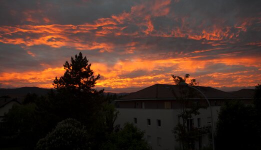 Blazing sky clouds red orange sky