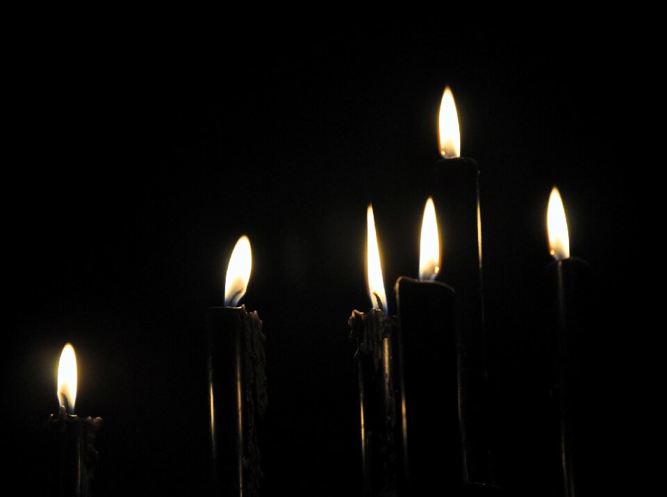 Darkness candlelight flames