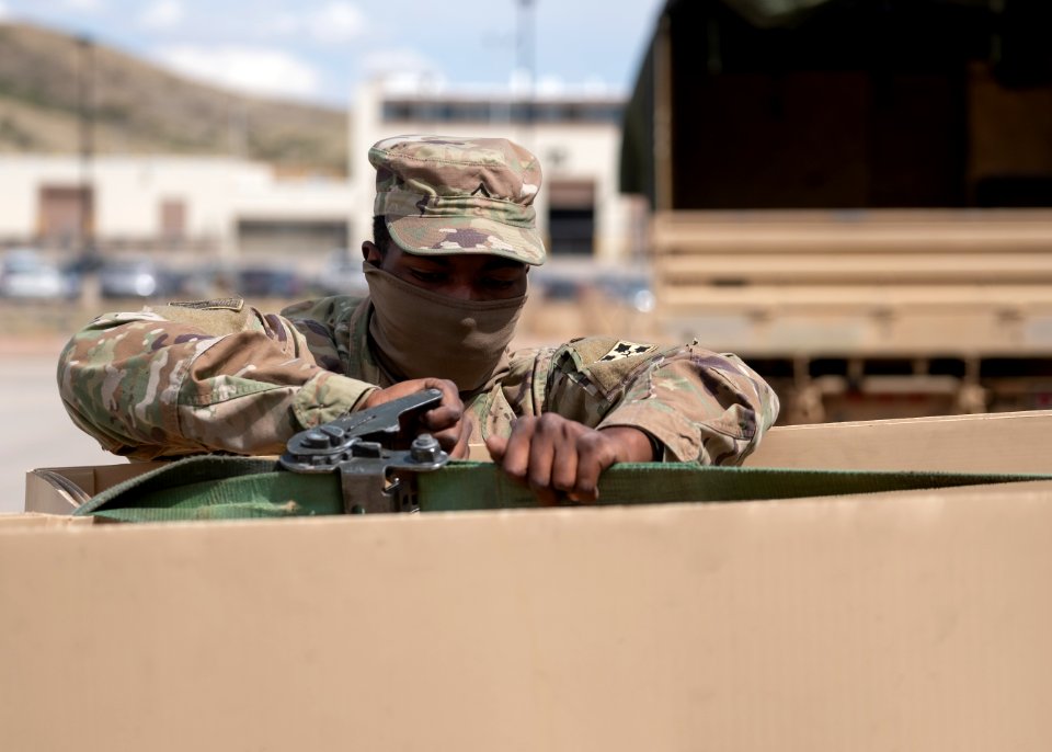 Soldier secures equipment