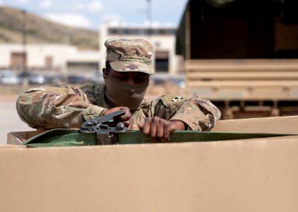 Soldier secures equipment