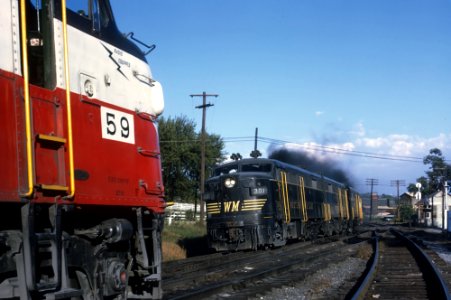 Western Maryland FA2s 301, 302, 303, and 304 plus SD40 7434 passing F7A 57 at Williamsport, MD on October 3, 1970