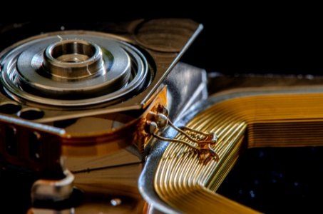 Connection of a coil which moves the hard drive actuator arm