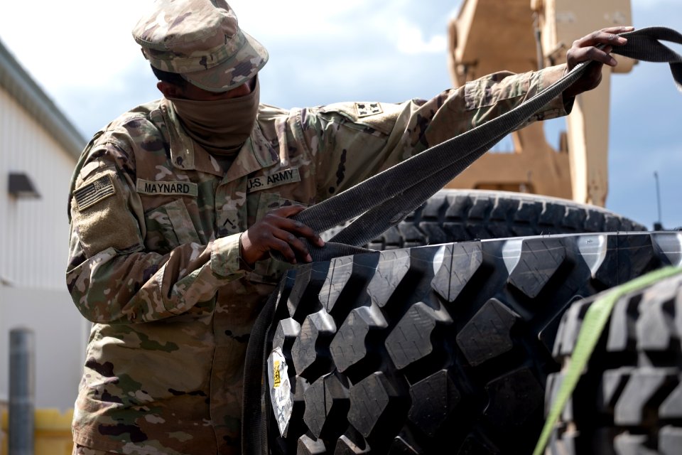 Soldier secures equipment