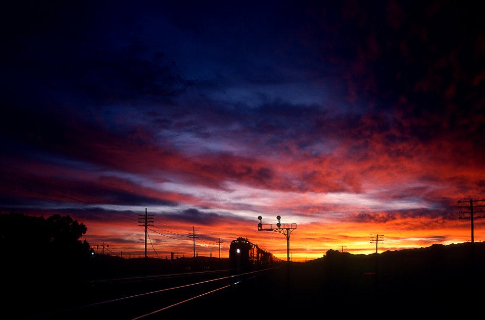 ATSF sunrise shots looking east at Daggett, CA in February 1984 -- 3 Photos