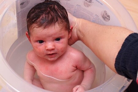 Baby infant taking bath
