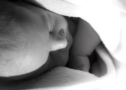 Sleeping small child infant photo