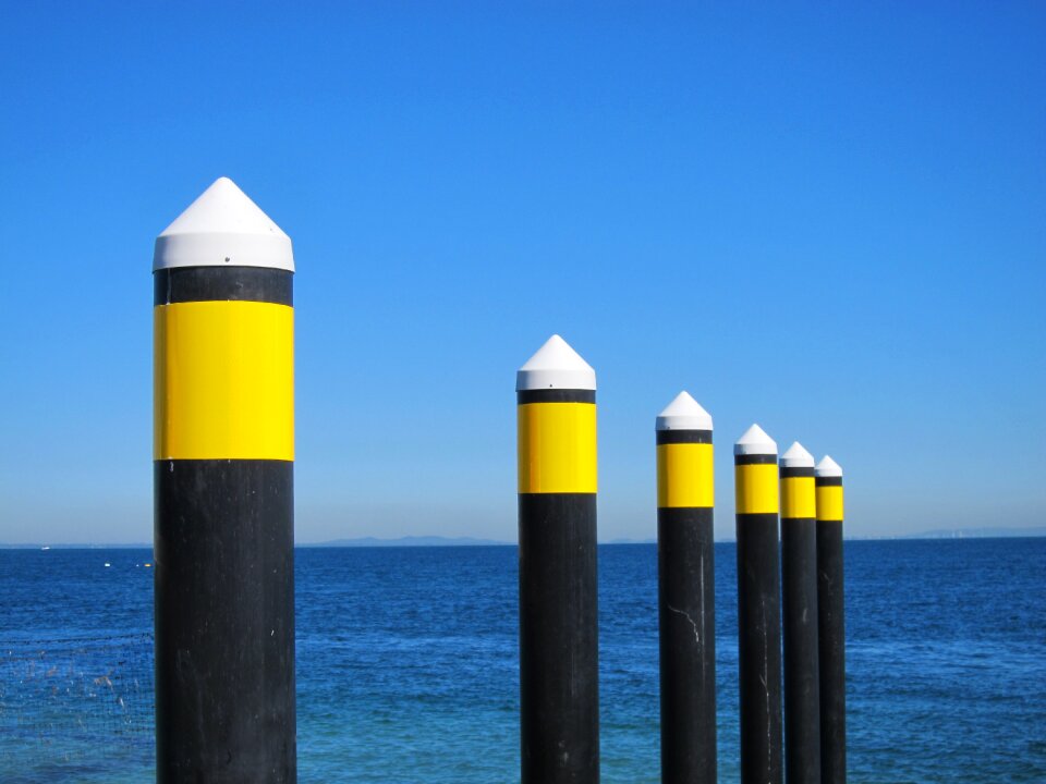 Water blue sky posts