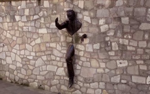 Statue in wall - la Passe-Muraille