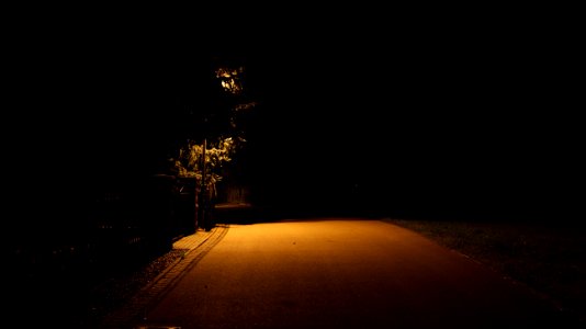 Lonely street at night photo