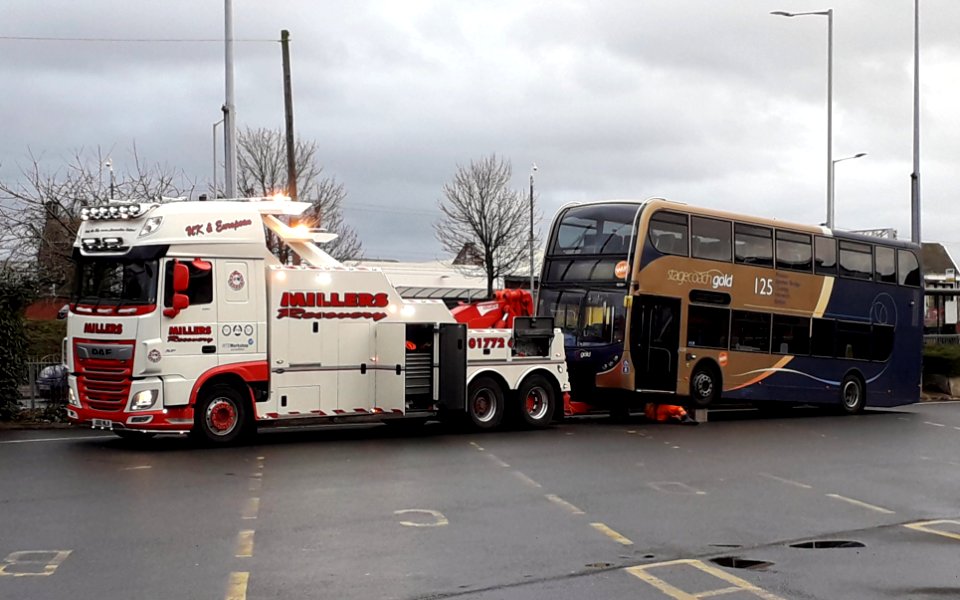 Gold Scania 15228 being recovered by Millers
