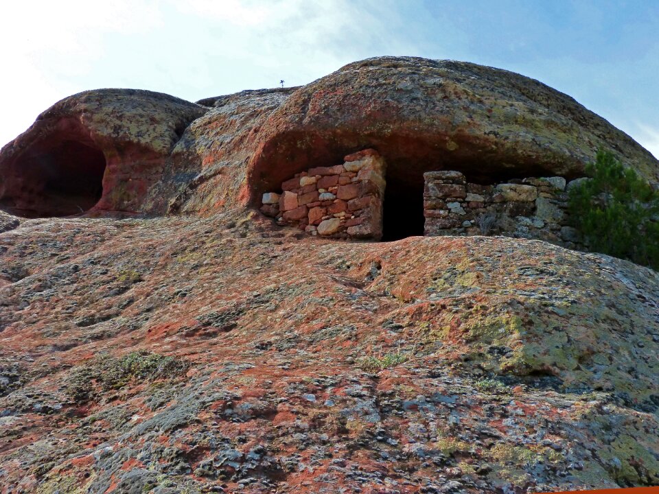 Red sandstone lichens rock wall