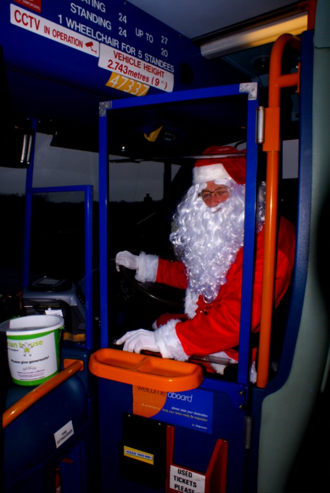 Stagecoach bus driver working as one of Santa's helpers, Christmas 2017