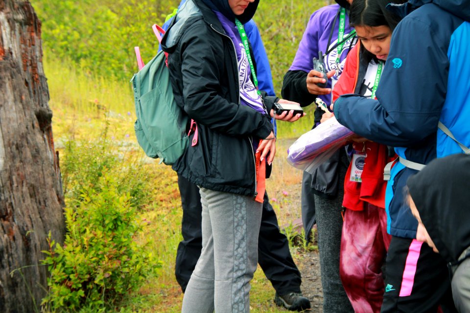 Taking out GPS coordinates at the Hummocks Trail