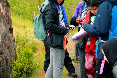 Taking out GPS coordinates at the Hummocks Trail