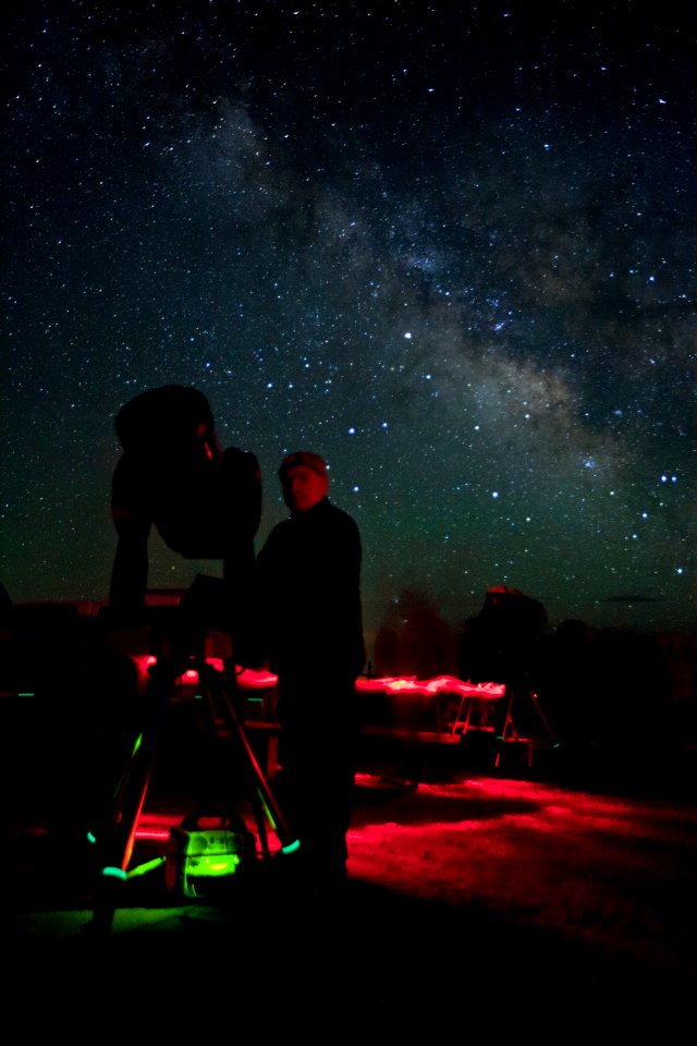 Astronomer with scope