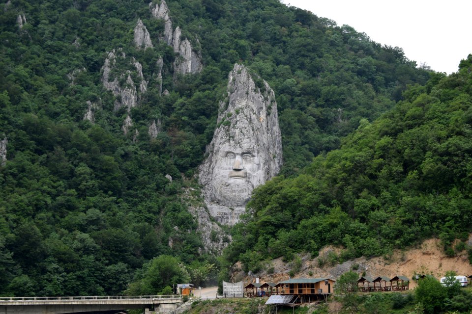 Bucharest to Budapest. Belgrade. Serbia. As Emerald Destiny. Statue of Dacian King Decebalus - a 40 meter high statue that is the tallest rock sculpture in Europe. It is located on the Danube's rocky bank,
