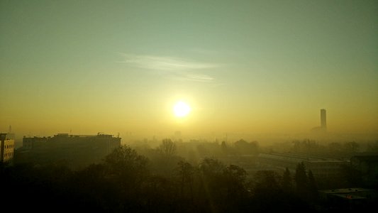 Beautiful smog crawling through Wrocław photo