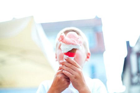 child lick handmade ice cream photo