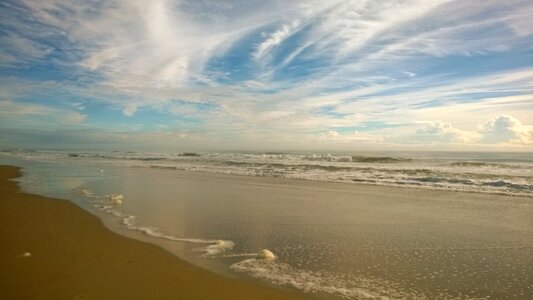 Clouds coastal foam photo