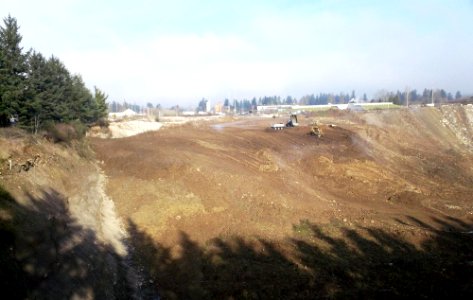 Knife River backfilling pit for final reclamation photo