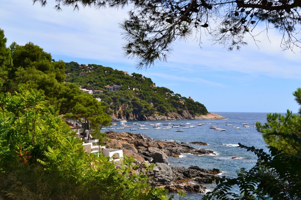 Cliff boats mediterranean photo