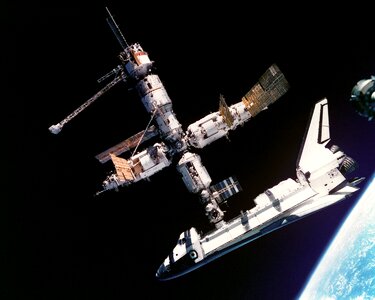 Docked connected astronauts photo