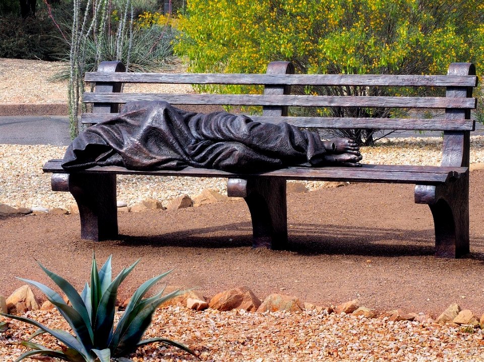 Homeless Jesus on bench
