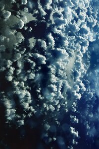 Clouds blue window blue airplane